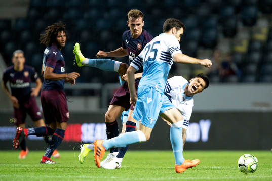 Rob Holding of Arsenal and Joaquin Correa of Lazio