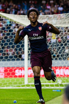 Reiss Nelson of Arsenal celebrates