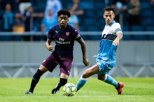 Reiss Nelson of Arsenal and Alessandro Murgia of Lazio