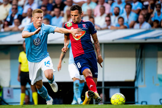 Anders Christiansen of Malmö FF and Anel Hadzic of Vidi