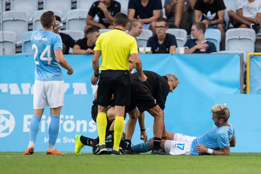 Rasmus Bengtsson of Malmö FF gets medical attention