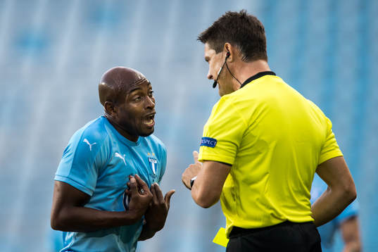 Fouad Bachirou of Malmö FF and referee Matej Jug