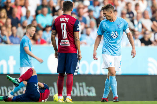 Markus Rosenberg of Malmö FF reacts against Boban Nikolov
