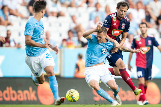 Arnór Ingvi Traustason of Malmö FF and Danko Lazović of