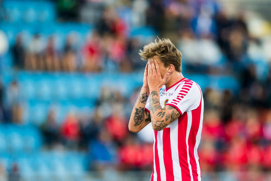 Runar Espejord of Tromsø looks dejected