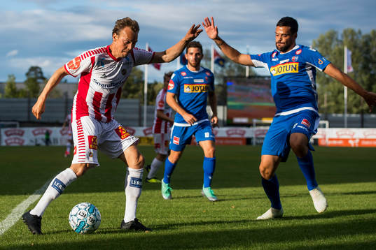 Magnus Andersen of Tromsø and Marcos Vales Gonzalez of