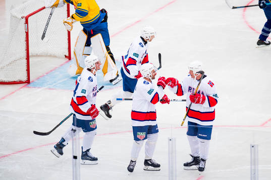 Erik Mortvedt and Roy Johansen of Norway celebrate a goal
