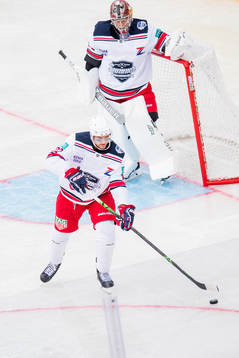 Nino Niederreiter and goaltender Antti Raanta of Team Zucca