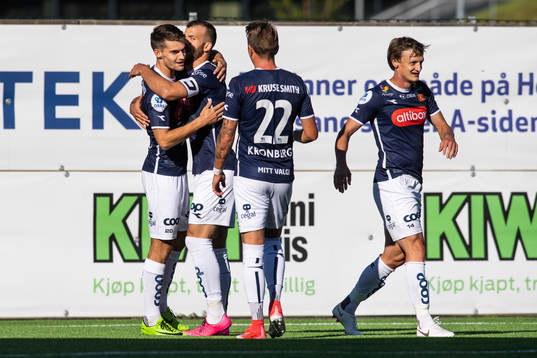 Ylldren Ibrahimaj of Viking celebrates with team mates