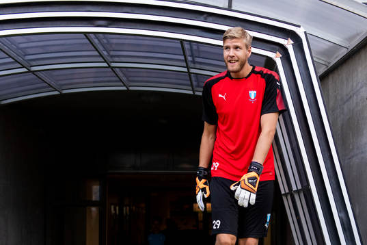 Goalkeeper Fredrik Andersson enters the pitch