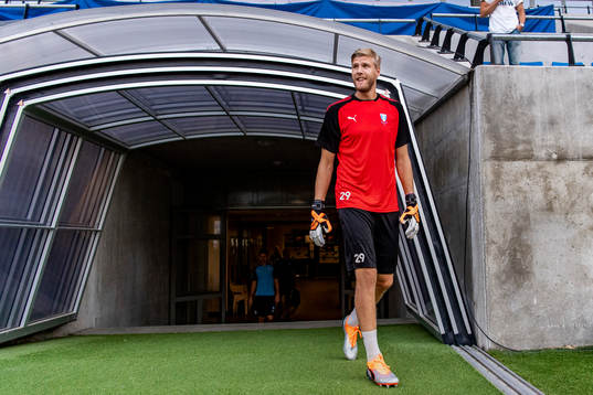Goalkeeper Fredrik Andersson enters the pitch