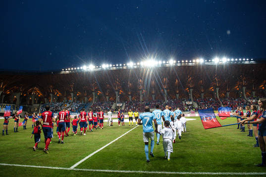 Players enters the pitch the UEFA Champions League