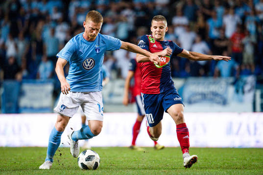 Anders Christiansen of Malmö FF against Istvan Kovacs of