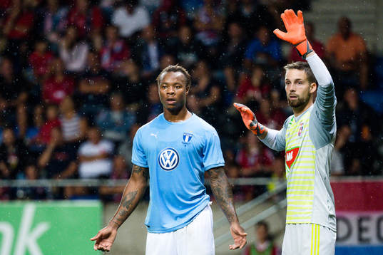 Carlos Strandberg of Malmö FF and goalkeeper Stefan