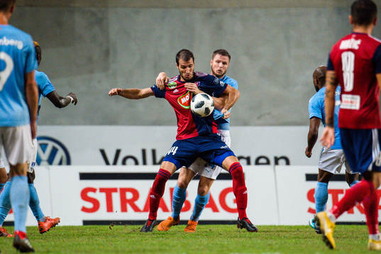 Marko Scepovic of Vidi against Lasse Nielsen of Malmö FF