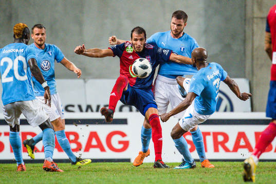 Marko Scepovic of Vidi against Lasse Nielsen and Fouad