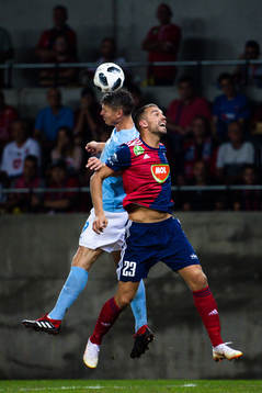 Markus Rosenberg of Malmö FF against Roland Juhasz of Vidi