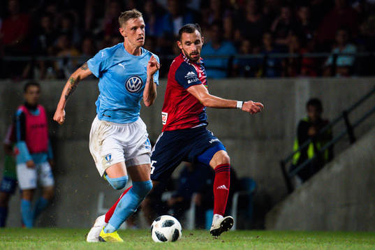 Sören Rieks  of Malmö FF  and Attila Fiola of Vidi