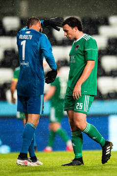 goalkeeper Mark McNulty and Barry McNamee of Cork City