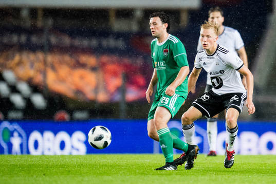 Barry McNamee of Cork City and Birger Meling of Rosenborg