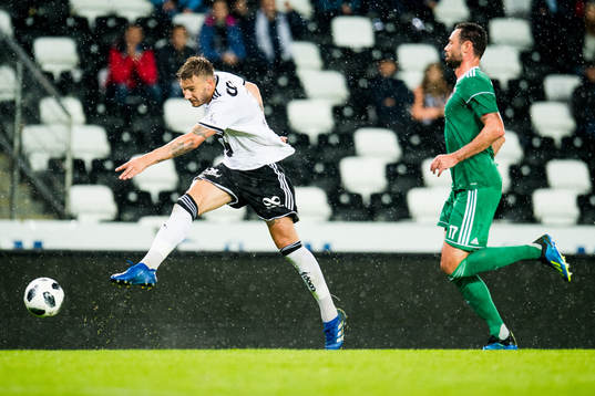 Nicklas Bendtner of Rosenborg and Damien Delaney of Cork