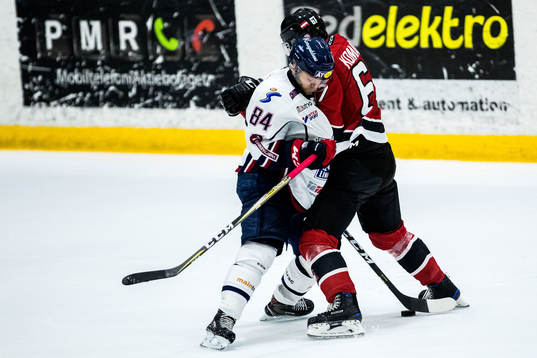 Linköpings Jimmy Andersson och Malmö Redhawks Konstantin