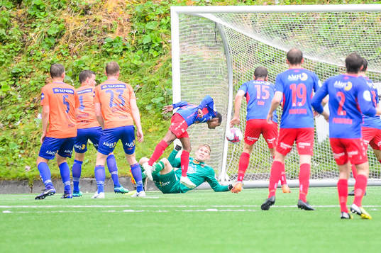 Mohammed Ahamed of Tromsdalen heads in 1-0