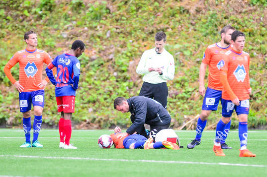 Fredrik Carlsen of Aalesund receives treatment