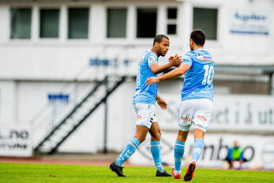 Erixon Danso of Sandnes Ulf celebrates with teammates Sanel