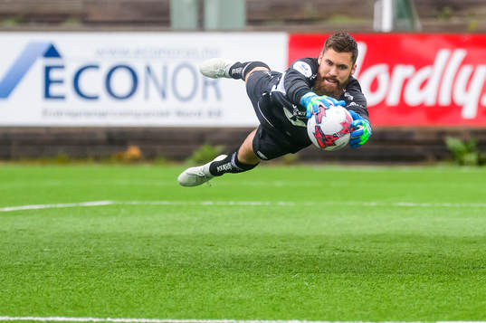 Goalkeeper Marius Berntzen of Tromsdalen saves