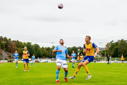 Sanel Kapidzic of Sandnes Ulf and Martin Hoel Andersen of