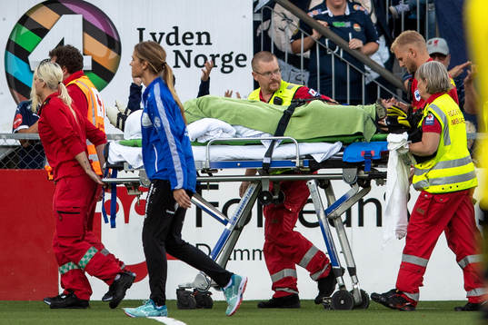 Goalkeeper Jonas Deumeland of Start leaves the pitch with