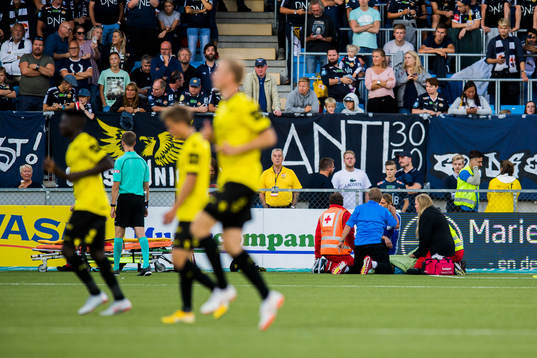 Goalkeeper Jonas Deumeland of Start lies down with an injury