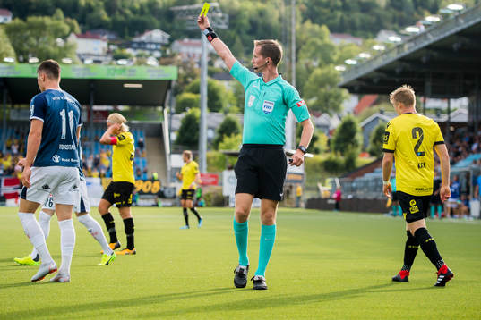 Kristoffer Tokstad of Strømsgodset is shown a yellow acts