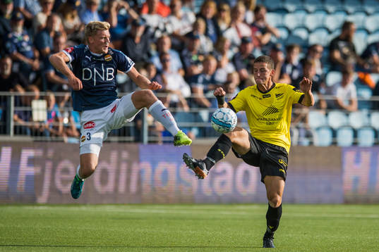 Jonathan Parr of Strømsgodset and Herolind Shala of Start