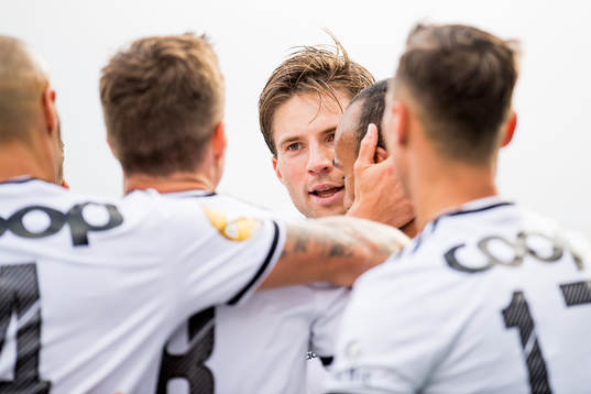 Marius Lundemo of Rosenborg celebrates with his teammates