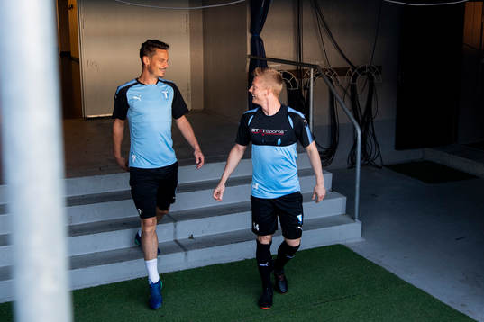 Markus Rosenberg and Anders Christiansen heading for the