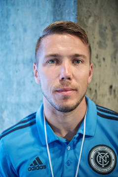 Anton Tinnerholm poses for a portrait at a press event with
