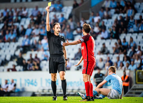 Jakob Poulsen of Midtjylland receives a warning