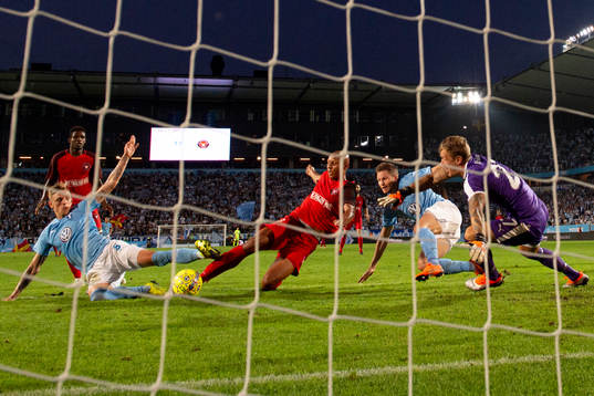Ayo Simon Okosun of Midtjylland scores 2-2 behind