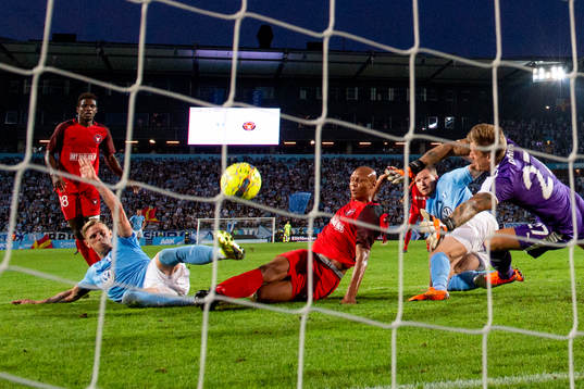 Ayo Simon Okosun of Midtjylland scores 2-2 behind