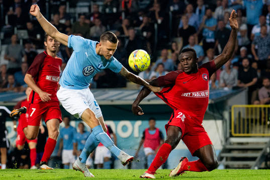 Arnór Ingvi Traustason of Malmö FF and Bubacarr Sanneh of