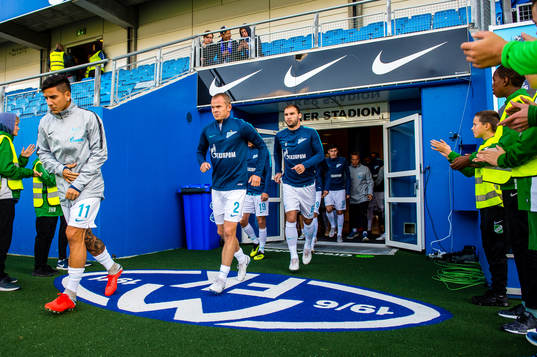 Sebastian Driussi and Aleksandr Anyukov of Zenit entering
