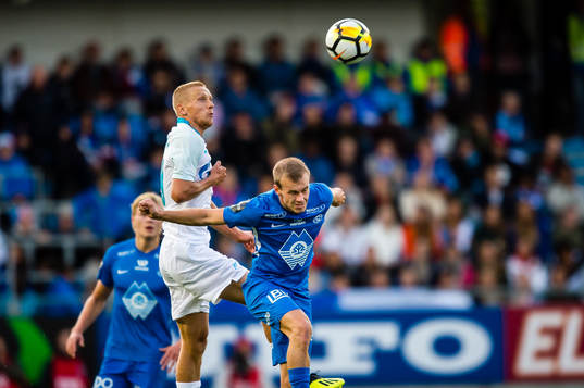 Igor Smolnikov of Zenit and Petter Dahle Strand of Molde