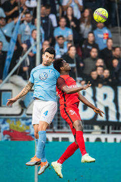 Behrang Safari of Malmö FF and Frank Ogochukwu of