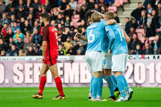 Marc Dal Hende of Midtjylland looks dejected while Malmö