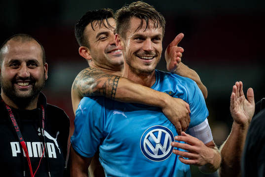 Markus Rosenberg and Behrang Safari of Malmö FF celebrate