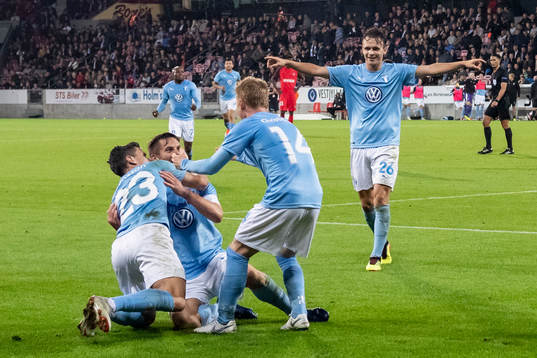 Markus Rosenberg is celebrated by Anders Christiansen,