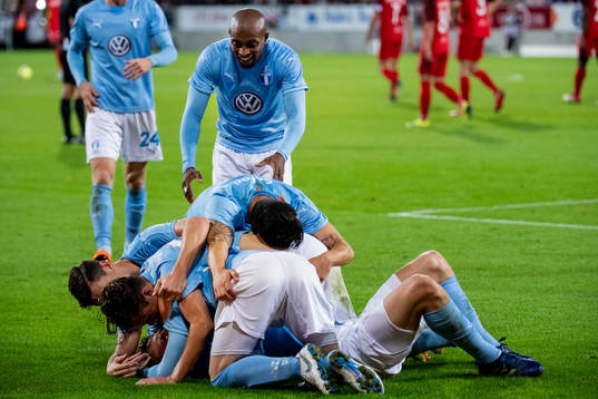 Markus Rosenberg of Malmö FF is celebrated by his teammates