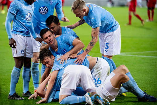 Markus Rosenberg of Malmö FF is celebrated by his teammates